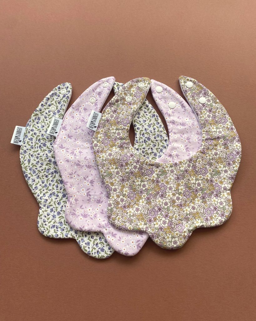 Handmade baby bibs in soft printed cotton